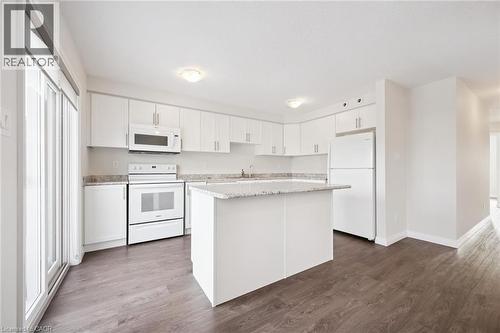 Second level kitchen island - 24 Morrison Road Unit# D10, Kitchener, ON - Indoor Photo Showing Kitchen