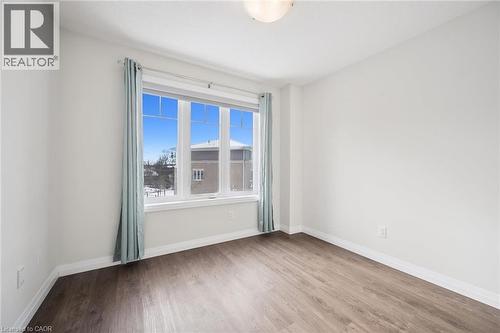Second bedroom; full sun southwest facing. - 24 Morrison Road Unit# D10, Kitchener, ON - Indoor Photo Showing Other Room