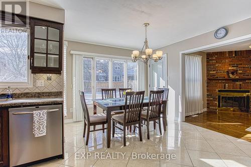 211 Rushdale Drive, Hamilton, ON - Indoor Photo Showing Dining Room With Fireplace