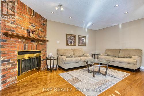 211 Rushdale Drive, Hamilton, ON - Indoor Photo Showing Living Room With Fireplace