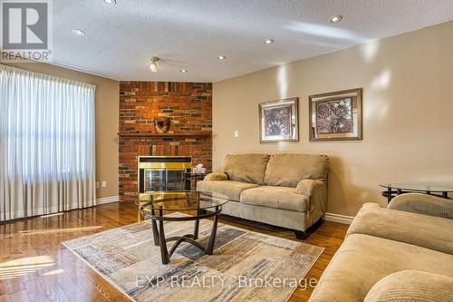 211 Rushdale Drive, Hamilton, ON - Indoor Photo Showing Living Room With Fireplace