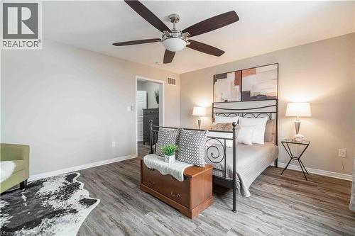 Primary bedroom with luxury vinyl laminate flooring. - 115 Larry Crescent, Caledonia, ON - Indoor