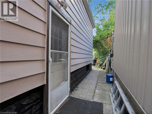View of side of home - 210 East 24Th Street, Hamilton, ON - Outdoor With Exterior
