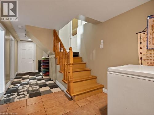 Stairs featuring baseboards - 210 East 24Th Street, Hamilton, ON - Indoor