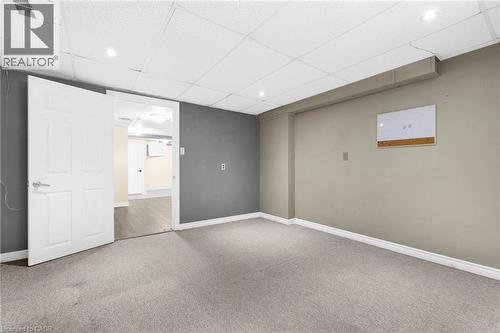 Finished below grade area featuring a drop ceiling, carpet floors, and recessed lighting - 368 Upper Kenilworth Avenue, Hamilton, ON - Indoor
