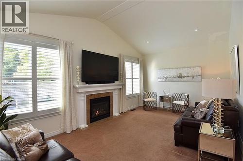 12 Degrow Crescent, Binbrook, ON - Indoor Photo Showing Living Room With Fireplace