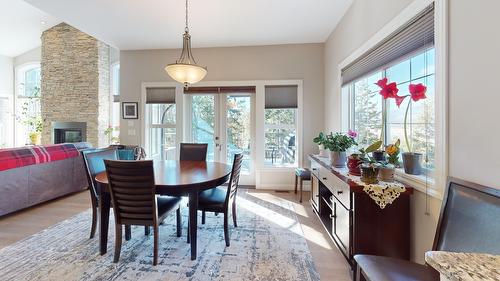1505 Mount Royal Ridge, Cranbrook, BC - Indoor Photo Showing Dining Room With Fireplace