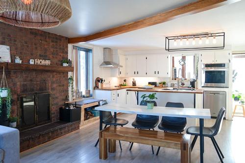 Dining room - 8100 Route Des Ormes, Bécancour, QC - Indoor With Fireplace