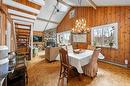Salle à manger - 2028 Rue De Chandolin, Val-David, QC  - Indoor Photo Showing Dining Room With Fireplace 