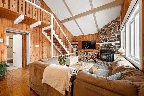 Salon - 2028 Rue De Chandolin, Val-David, QC - Indoor With Fireplace