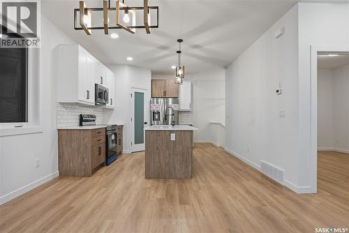 1170 Nightingale Terrace, Saskatoon, SK - Indoor Photo Showing Kitchen With Upgraded Kitchen