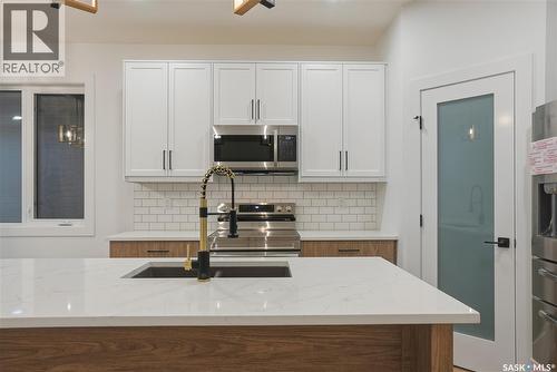 1170 Nightingale Terrace, Saskatoon, SK - Indoor Photo Showing Kitchen With Double Sink With Upgraded Kitchen
