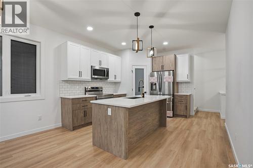 1170 Nightingale Terrace, Saskatoon, SK - Indoor Photo Showing Kitchen With Upgraded Kitchen