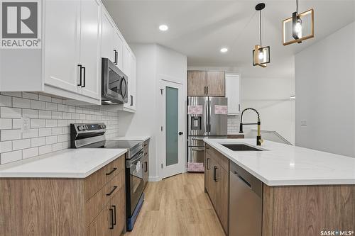 1170 Nightingale Terrace, Saskatoon, SK - Indoor Photo Showing Kitchen With Upgraded Kitchen