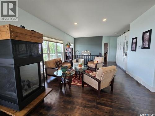 207 Criddle Avenue, Crooked Lake, SK - Indoor Photo Showing Living Room With Fireplace