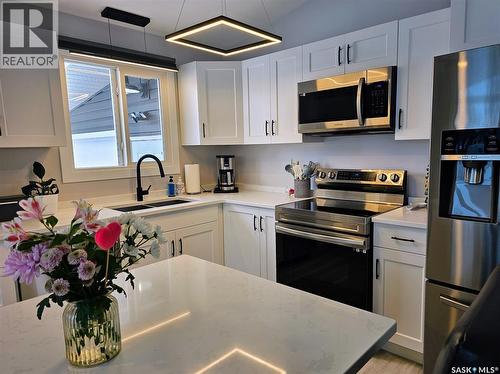 25 King Crescent, Humboldt, SK - Indoor Photo Showing Kitchen With Stainless Steel Kitchen With Double Sink