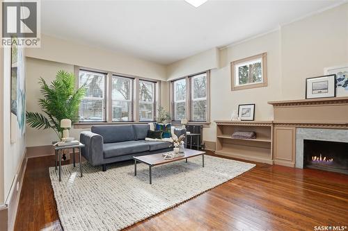 1213 Elliott Street, Saskatoon, SK - Indoor Photo Showing Living Room With Fireplace