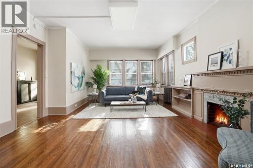 1213 Elliott Street, Saskatoon, SK - Indoor Photo Showing Other Room With Fireplace