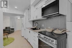 LOWER - 66 SILVERTHORN AVENUE  Toronto, ON M6N 3J8