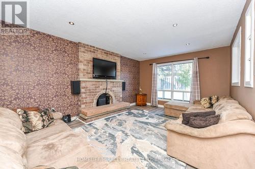 2291 Marzipan Court, Mississauga, ON - Indoor Photo Showing Living Room With Fireplace
