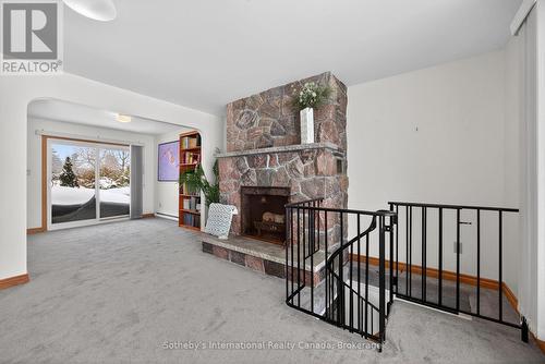 Dining space beside the fireplace - 1420 Tiny Beaches Road N, Tiny, ON - Indoor With Fireplace