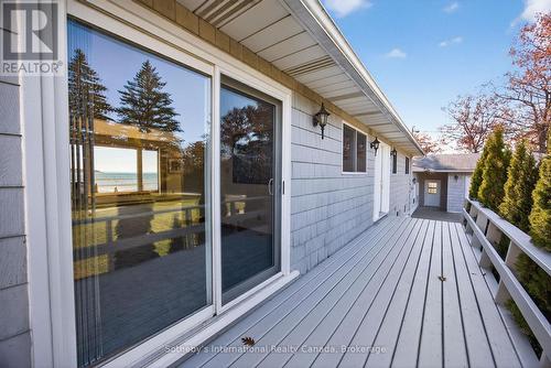 Front deck & dining room patio doors - 1420 Tiny Beaches Road N, Tiny, ON - Outdoor With Exterior