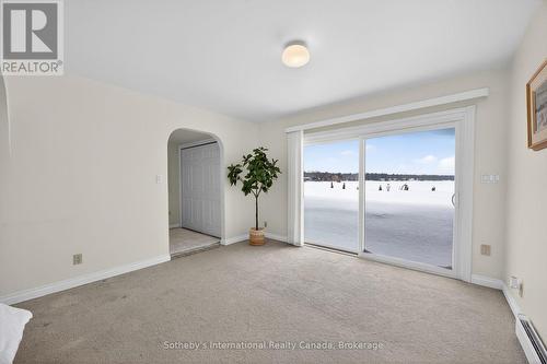 Second primary bedroom w/o to pool & beach - 1420 Tiny Beaches Road N, Tiny, ON - Indoor Photo Showing Other Room