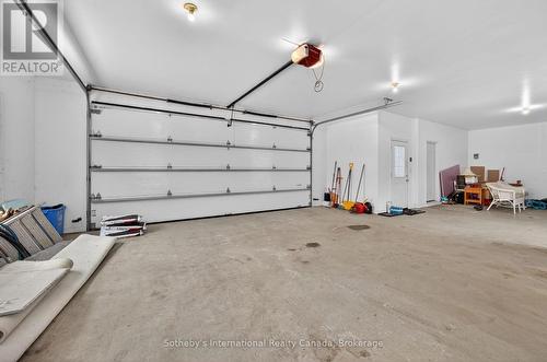 Clean finished garage - 1420 Tiny Beaches Road N, Tiny, ON - Indoor Photo Showing Garage