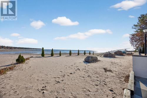 Beach sand at your doorstep - 1420 Tiny Beaches Road N, Tiny, ON - Outdoor With Body Of Water With View