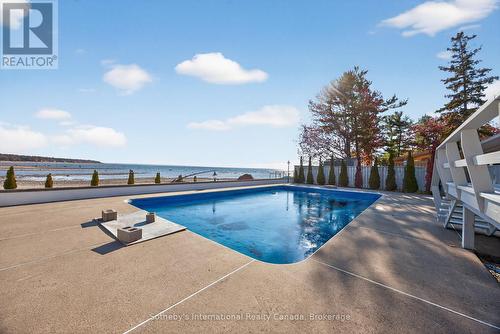 Pool living & waterfront beach living - all in one - 1420 Tiny Beaches Road N, Tiny, ON - Outdoor With In Ground Pool