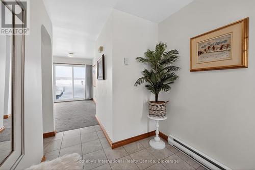 Views directly to water when entering main foyer - 1420 Tiny Beaches Road N, Tiny, ON - Indoor Photo Showing Other Room