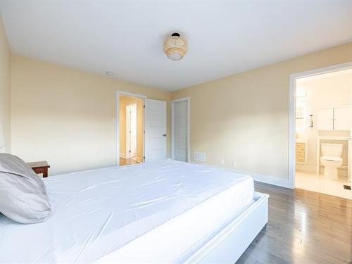 Chambre à coucher principale - 5808 Rue Alphonse, Brossard, QC - Indoor Photo Showing Bedroom