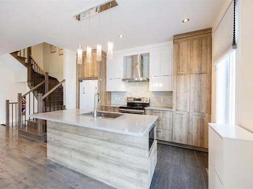 Cuisine - 5808 Rue Alphonse, Brossard, QC - Indoor Photo Showing Kitchen With Upgraded Kitchen