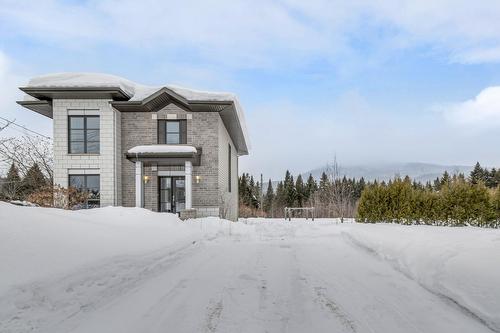 Stationnement - 43 Rue Solidago, Sainte-Brigitte-De-Laval, QC - Outdoor With Facade