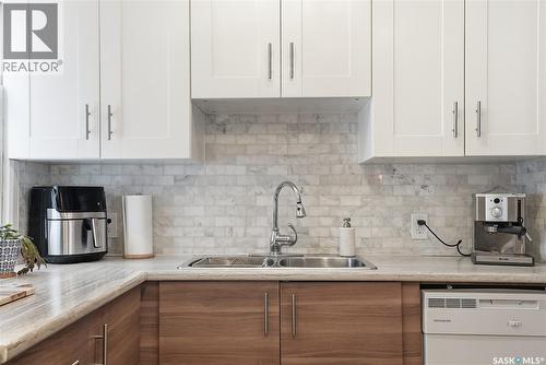 215 Ash Street E, Saskatoon, SK - Indoor Photo Showing Kitchen With Double Sink