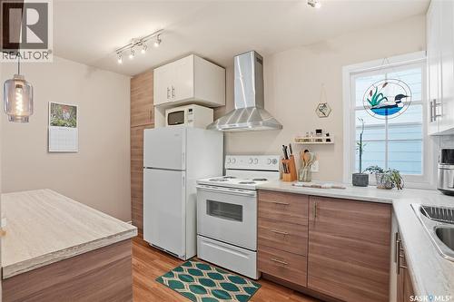 215 Ash Street E, Saskatoon, SK - Indoor Photo Showing Kitchen With Double Sink
