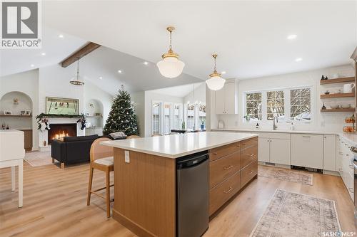 224 Elm Street E, Saskatoon, SK - Indoor Photo Showing Kitchen With Fireplace With Double Sink