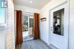 Sunroom with Patio Door Access to Backyard - 