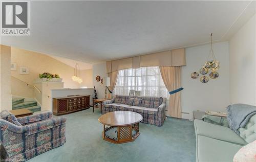 26 Deerpark Crescent, Kitchener, ON - Indoor Photo Showing Living Room With Fireplace