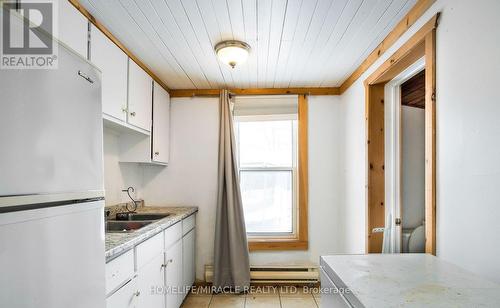 101 River Road E, Wasaga Beach, ON - Indoor Photo Showing Kitchen With Double Sink