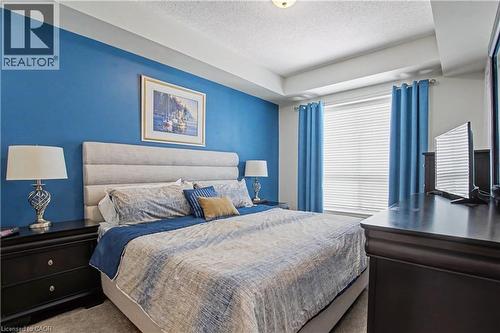 Spacious bedroom - 2000 Creekside Drive Unit# 708, Hamilton, ON - Indoor Photo Showing Bedroom