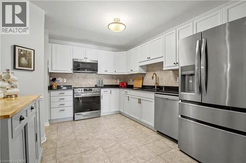 2000 Creekside Drive Unit# 708, Hamilton, ON - Indoor Photo Showing Kitchen With Upgraded Kitchen