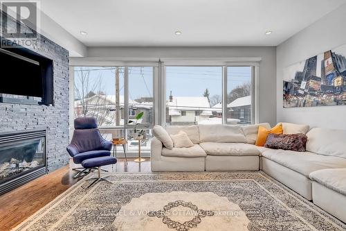 32 Sims Avenue, Ottawa, ON - Indoor Photo Showing Living Room With Fireplace