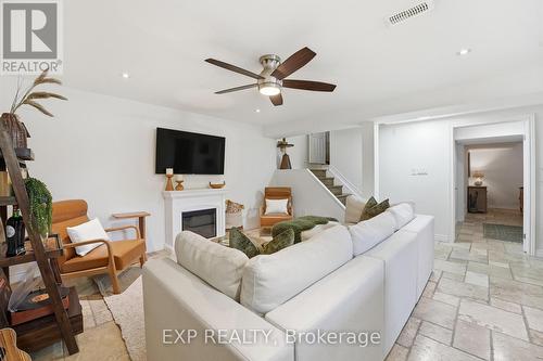 1 - 19 Bartlett Avenue, Grimsby, ON - Indoor Photo Showing Living Room With Fireplace