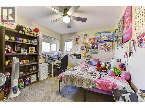 9810 Venables Drive, Coldstream, BC - Indoor Photo Showing Bedroom