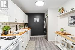 Kitchen with Butcher Block Counter and large sink - 