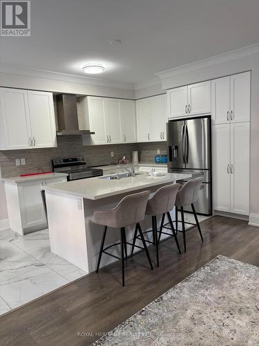 65 Conarty Crescent E, Whitby, ON - Indoor Photo Showing Kitchen With Double Sink