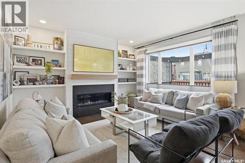 1015 Muzyka Road, Saskatoon, SK - Indoor Photo Showing Living Room With Fireplace