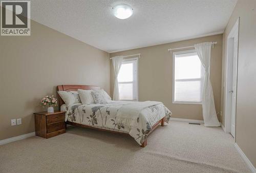 125 Silverado Range Cove Sw, Calgary, AB - Indoor Photo Showing Bedroom