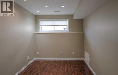 125 Silverado Range Cove Sw, Calgary, AB - Indoor Photo Showing Other Room